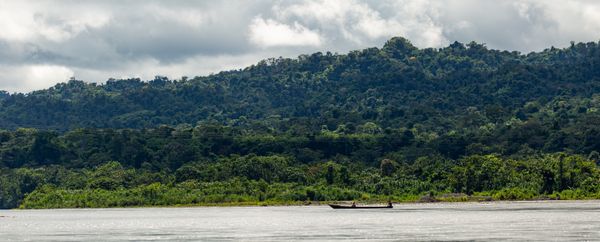 Sailing across the river in Manu National Park thumbnail