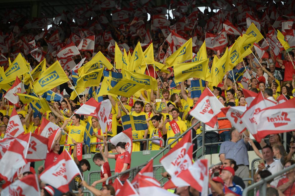 Sweden's fans wave IKEA flags prior to the UEFA Euro 2024 group F qualification football match between Austria and Sweden in Vienna on June 20, 2023.