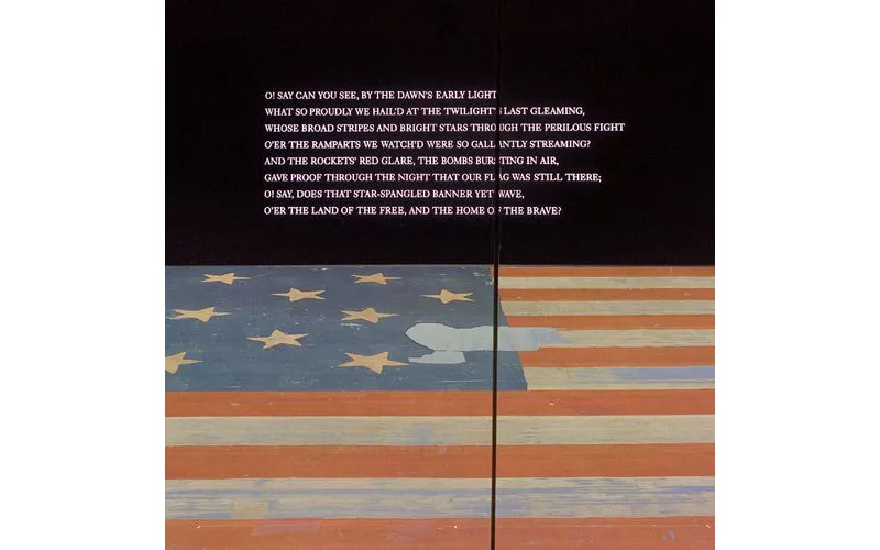 The first stanza of the national anthem is projected prominently on the wall above the Star-Spangled Banner in the museum. (NMAH)