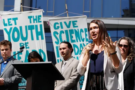 Kelsey Rose Juliana, one of 21 plaintiffs in Juliana v. United States, speaks at a rally in Portland, Oregon on Tuesday, June 4, 2019. That day, three federal judges heard arguments for the case. 