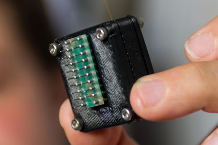 A one-inch sensor, mounted on a robotic arm, can analyzes compounds emitted by plants to detect disease before it's too late.