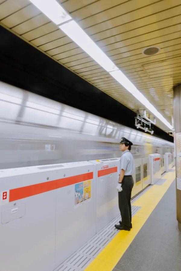 Tokyo subway station staff thumbnail