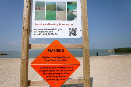 A beach closed during Lake Erie’s 2014 toxic algal bloom
