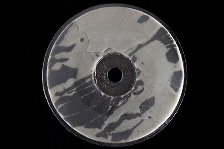 This wax-and-cardboard disc from 1885 contains a recording of Bell’s voice.