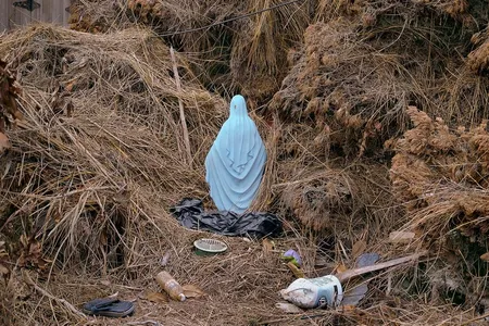 Statue in front yard, Chalmette neighborhood
