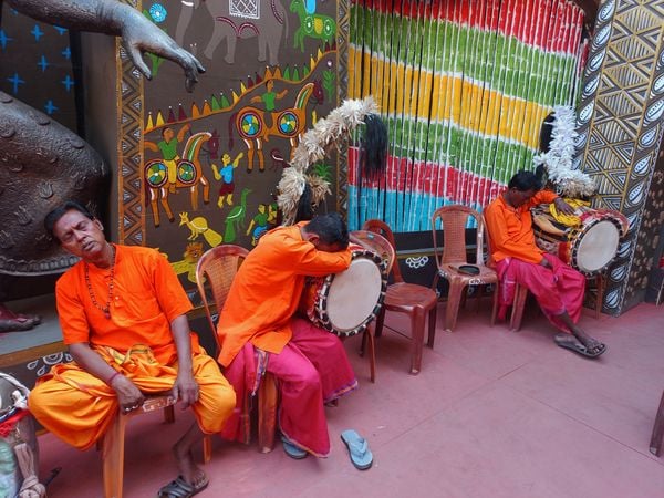 "Dhakis" (drummers) taking a short break during pujas thumbnail