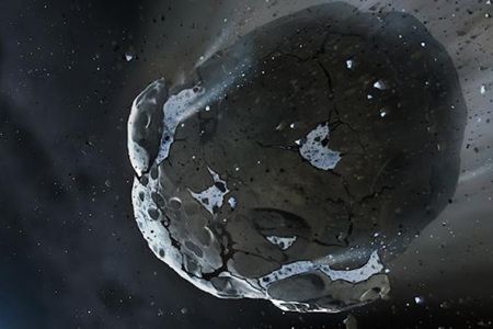 An artist’s depiction of the newly discovered ice-rich, rocky asteroid that was ripped apart by the distant white dwarf star 200 million years ago.