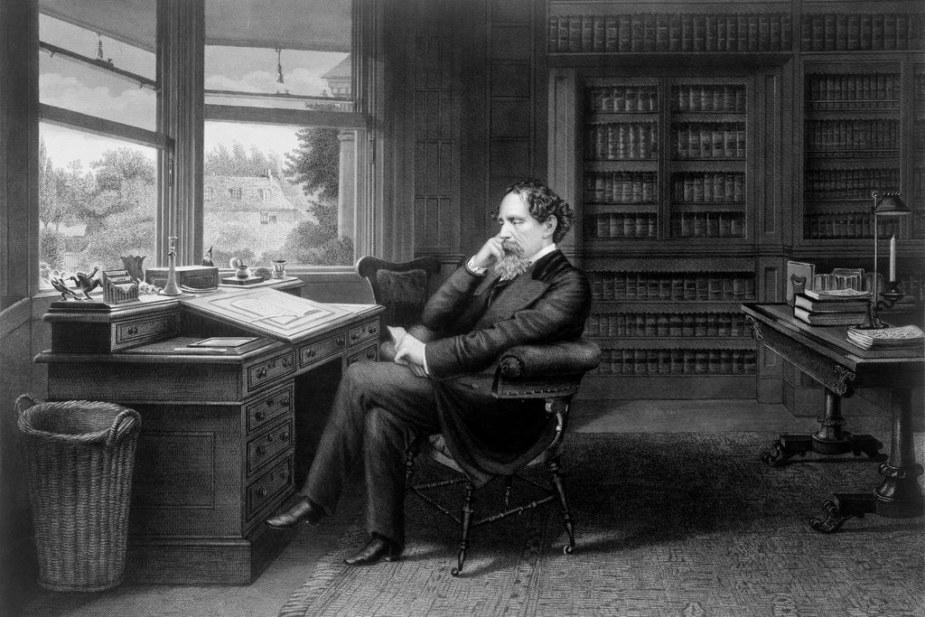 Charles Dickens in his study