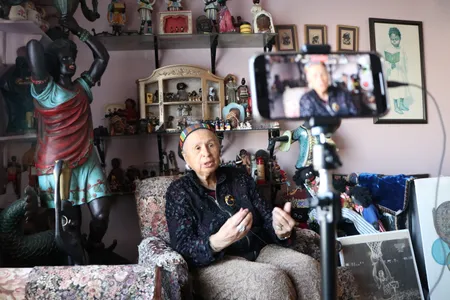 Every wall, table and shelf in Elizabeth Meaders' three-story Staten Island home is crammed with pictures, posters, signs, statues, medals, sports memorabilia and military gear.