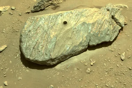 Perseverance drilled into a briefcase-sized Martian boulder named Rochette. The rock is located in the Citadelle location within the Jezero Crater.
