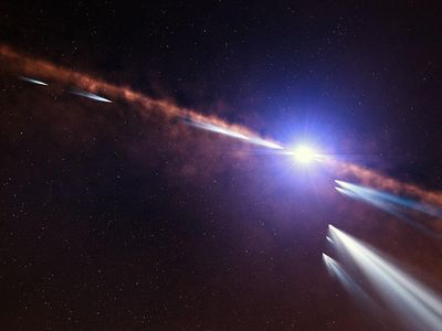 An artist's impression shows exocomets orbiting the star Beta Pictoris