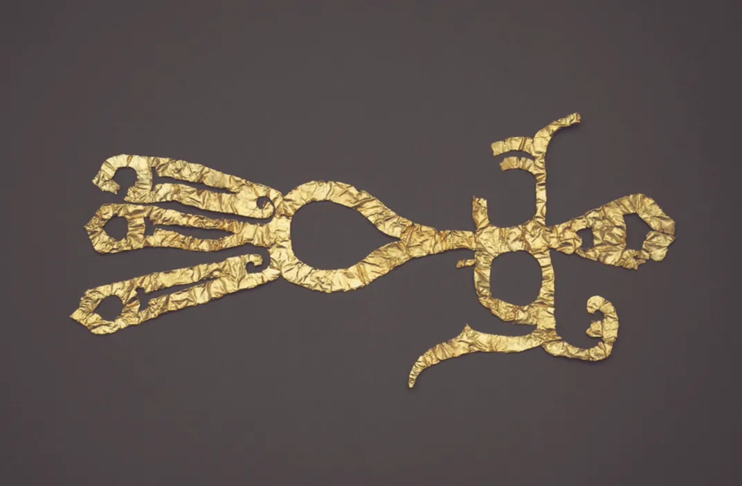 Bird-shaped gold ornament