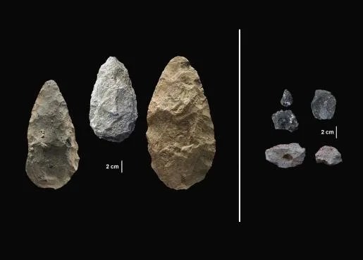 Stone handazes and stone points on a black background