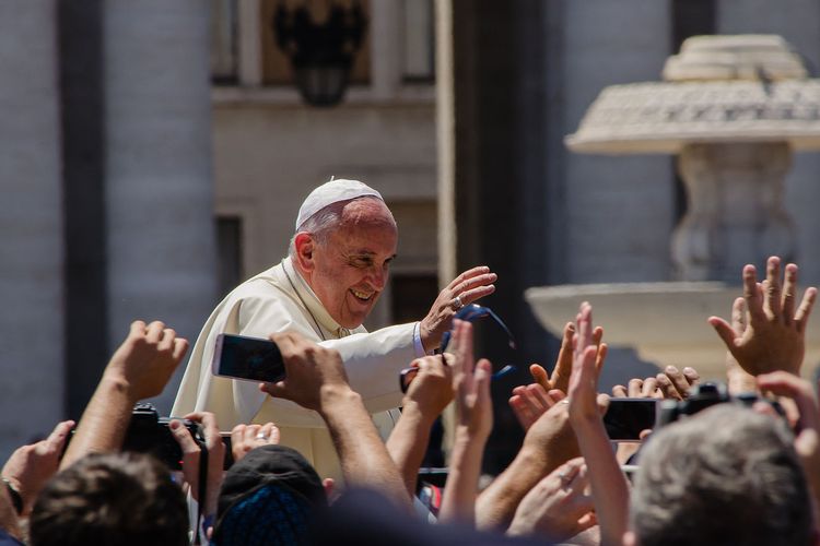 Pope Francis greets crowds in St. Peter&#39;s Square in 2014.