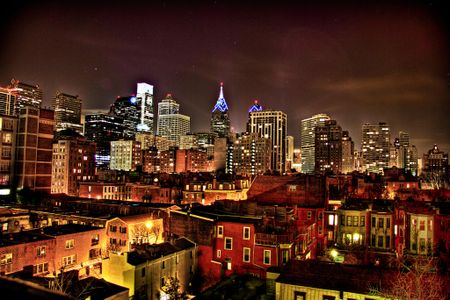 The lights of the Philadelphia skyline at night.