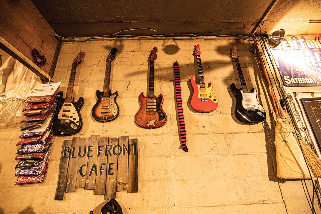 Guitars on wall at Blue Front Cafe 