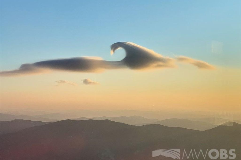 Two rare cloud features lit by the sunrise