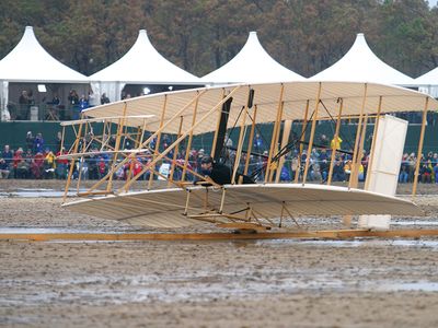 A reproduction Wright <i>Flyer</i>, with pilot Kevin Kochersberger,  was foiled by bad weather on this particular attempt on December 17, 2003. But it had already flown successfully to mark the 100th anniversary of Orville and Wilbur’s triumph.