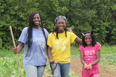 Xanthia DeBerry, with her daughters Angelica and Aniaya, is part of the seed saving project.