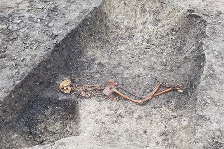 Researchers say the Iron Age man—found facedown with his hands bound together near the waist—was likely murdered or executed. 