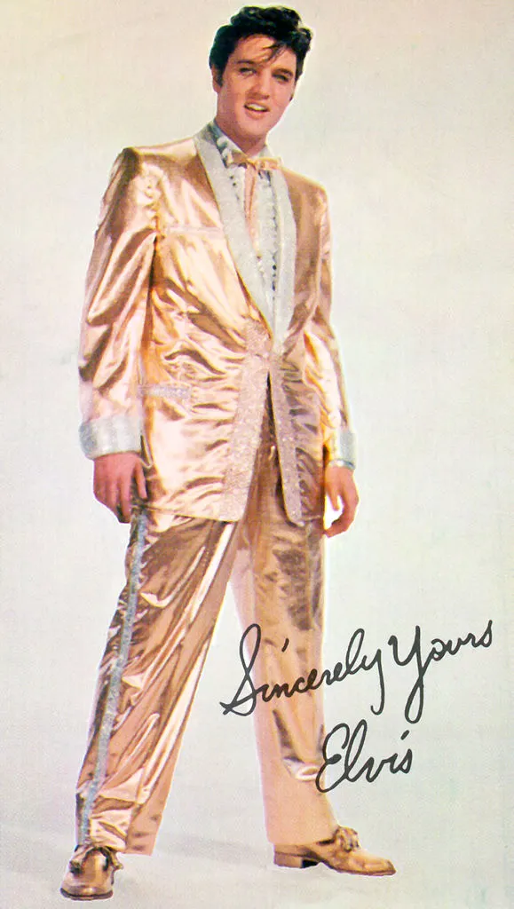 Elvis Presley in gold Nudie suit