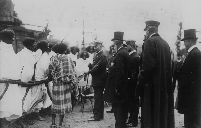 Wilhelm II of Germany talks to individuals on display in a "human zoo" at Tierpark Hagenbeck in 1909.