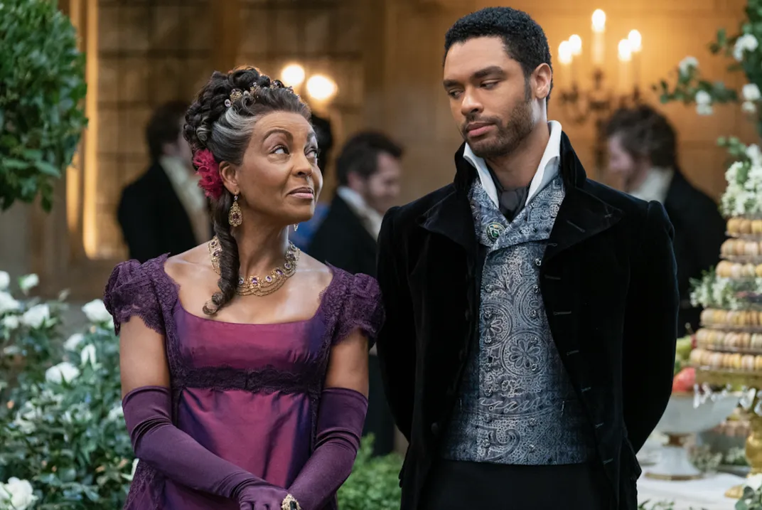 Adjoa Andoh as Lady Agatha Danbury and Regé-Jean Page as Simon Basset, Duke of Hastings, in "Bridgerton"