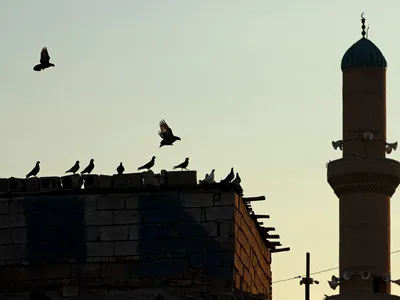 Minarets are built adjacent to mosques and used to call Muslims to prayer.