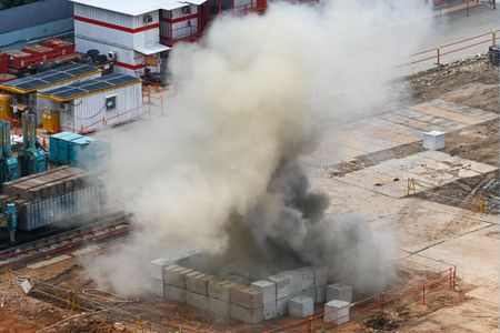 Smoke rises after a World War II-era aerial bomb was detonated at a construction site in Singapore on September 26, 2023.