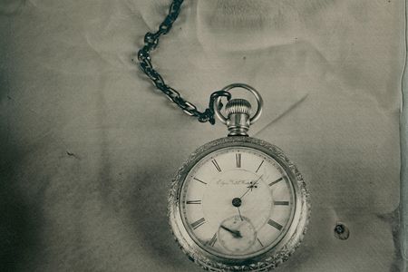 Pocket watch with engraved, gold-plated case found on the body of postal clerk John Starr March. The hands point to 1:27, around when the Titanic sank on the morning of April 15, 1912.