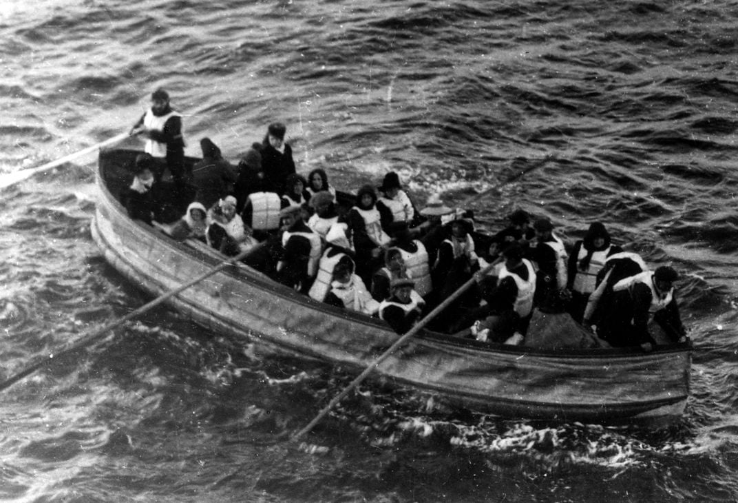 A lifeboat carrying survivors of the Titanic disaster