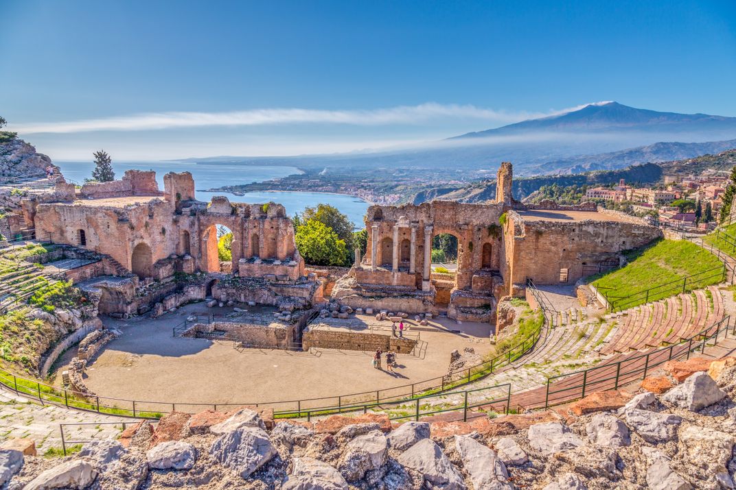 The Greek theater of Taormina with Mt. Etna in the background