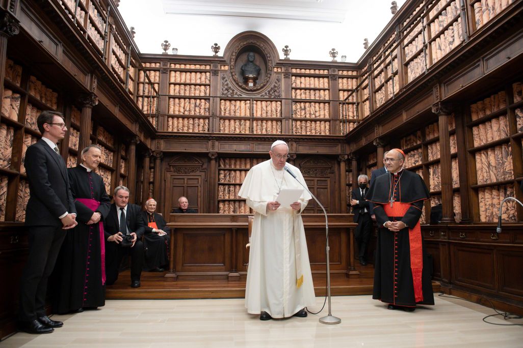 Pope Francis speaks at the installation's opening