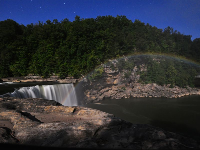 A moonbow rainbow appears over Cumberland Falls, Corbin, KY