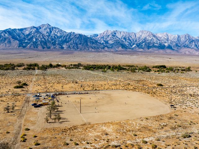 Visitors to Manzanar National Historic Site will be able to run the bases around the restored baseball field, sit on the bleachers and look out into the looming mountain range from home plate.