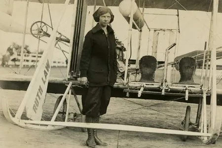 Ruth Law stands in front of her Wright Model B biplane at the New York State Fair, Yonkers, 1913. 