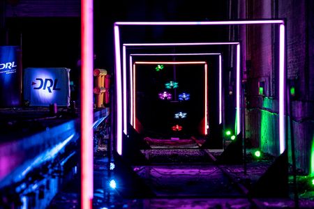 Away they go: Six quadrotors zip down a 300-foot straightaway at a Drone Racing League event in Ohio. The drones are small, but they hit 80 mph.