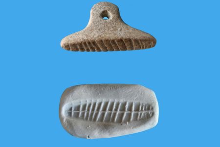 Researchers discovered a clay fragment bearing the impressions of at least two seals. One seal featured a long line intersected by shorter strokes.