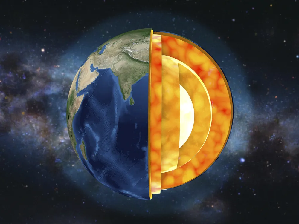 a graphical cross-section of the Earth against the milky way