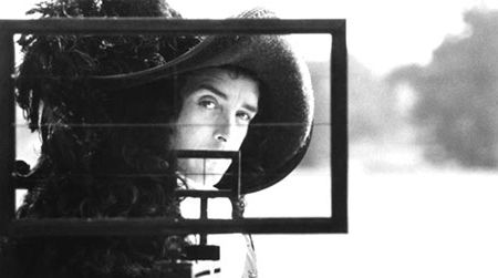 The titular draughtsman looks through his perspective machine in this still from Peter Greenaway’s 1982 film The Draughtsman’s Contract