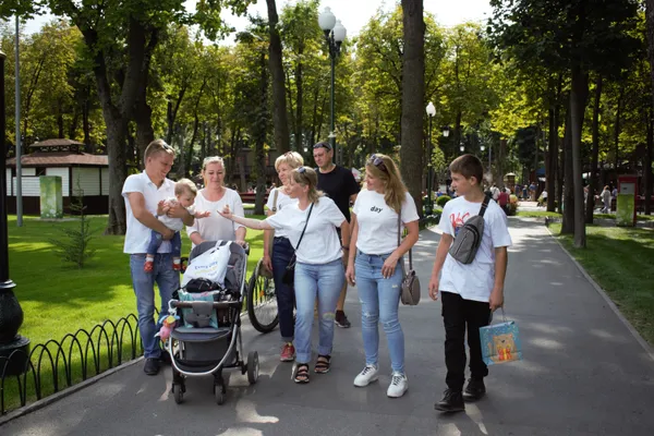 A big family is taking a stroll in the Gorky central park thumbnail