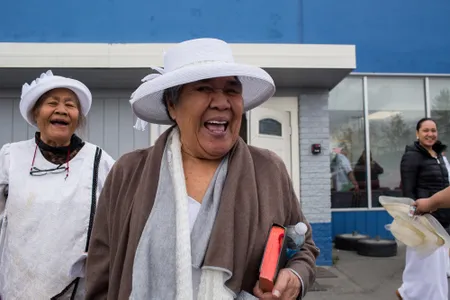 Sunday services let out at the Congregational Christian Church of American Samoa.