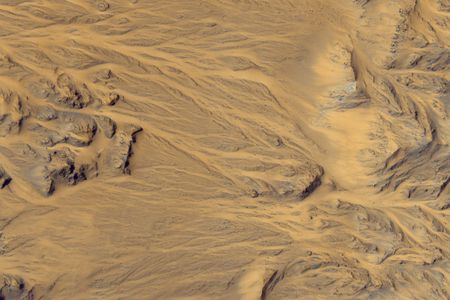 Evidence for flowing water on Mars, as seen by the HiRISE camera on the Mars Reconnaissance Orbiter. How much was contributed by rainfall?