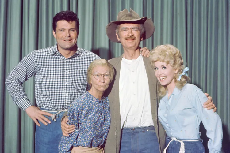 "The Beverly Hillbillies" cast in 1963, from left to right: Max Baer Jr. (as Jethro Bodine); Irene Ryan (as Granny, Daisy Moses); Buddy Ebsen (as Jed Clampett); and Donna Douglas (as Elly May Clampett)