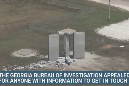 Screenshot of news coverage of the demolition of Georgia Guidestones