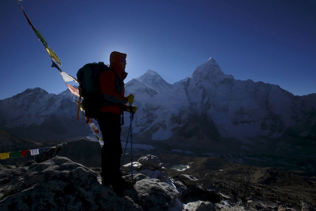 Hiker looking at Mount Everest