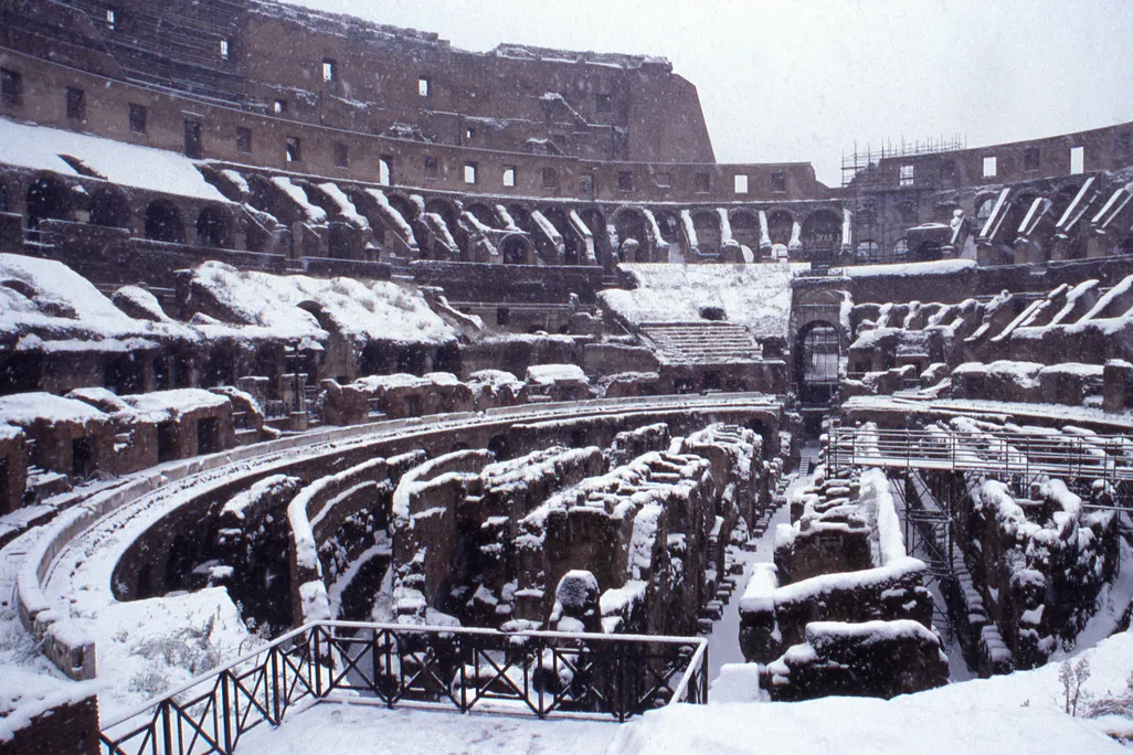 Snow covering interior of the Colosseum in Rome