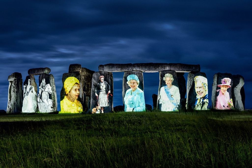 Stonehenge with images of Elizabeth II projected on it