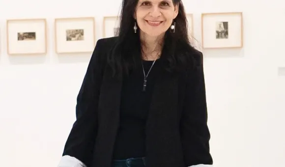 Katzman-Headshot-photo credit-Olive Santos-cropped lighter version.png