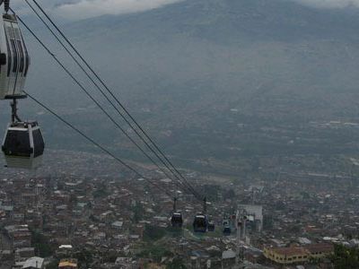 Medellin’s new metro cable system carries commuters in gondolas up a steep mountainside